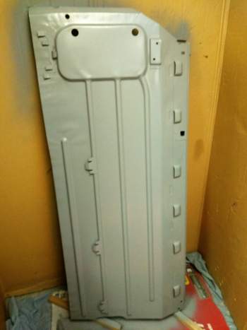 Austin Mini City Floor Pan with a Temporary Coat of Etch Primer.